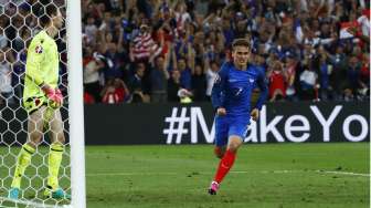 Pemain Prancis Antoine Griezmann merayakan golnya ke gawang Albania. Reuters/Eddie Keogh Livepic