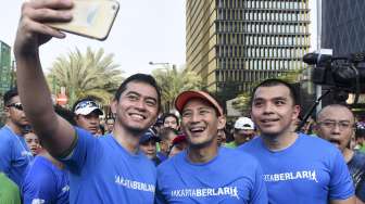 Pake Kaos Khusus di arena Marathon, Sandiaga Bantah Kampanye