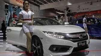 PT Honda Prospect Motor kembali meluncurkan varian baru generasi ke-10 Honda Civic, yaitu All-New Honda Civic Turbo Prestige, di ajang GIIAS 2016 di Tangerang, Banten, Minggu (14/8/2016). [Suara.com/Kurniawan Mas'ud]