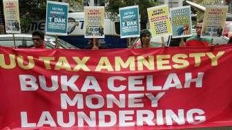 Buruh Tolak UU Tax Amnesty