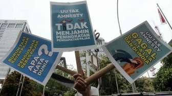 Buruh Tolak UU Tax Amnesty