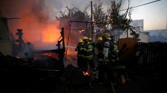 Api Hanguskan Sebagian Besar Israel