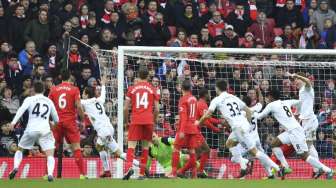 Liverpool Dipermalukan Swansea di Anfield