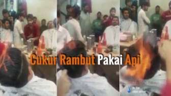 Ekstrem! Orang Ini Pangkas Rambut dengan Cara Dibakar