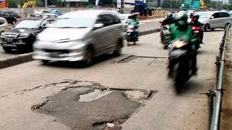 Dear Pengemudi Ibu Kota, Waspadai Ribuan Titik Jalan Rusak Terimbas Banjir