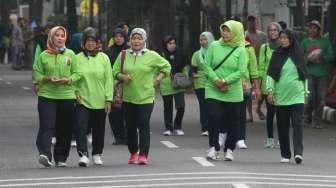 Car Free Day (CFD) di sepanjang Jalan Doktor Saharjo hingga Jalan Minangkabau Barat, Jakarta Selatan, Minggu (26/3).  