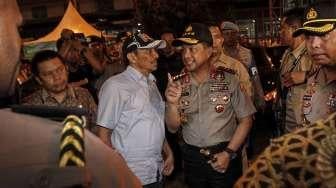 Kapolri Jenderal Pol Tito Karnavian saat berada di lokasi terjadinya ledakan bom di Terminal Kampung Melayu, Jakarta, Jumat (26/5/2017). [Suara.com/Kurniawan Mas'ud]