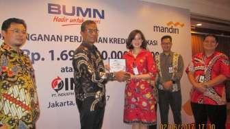 Ini Bentuk Kerjasama Bank Mandiri Dengan Garuda Indonesia