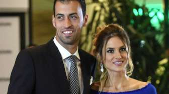 Sergio Busquets bersama isteri hadiri pernikahan Messi [AFP]