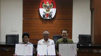 Penandatanganan MoU Ketua KPK Agus Rahardjo dengan Dirut BPJS Kesehatan Fachmi Idris di Gedung KPK, Jakarta, Rabu (19/7).