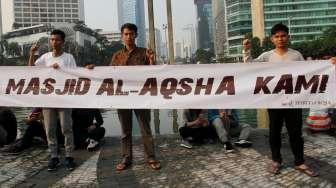 Aliansi Indonesia Membela Masjid Al Aqsa di kawasan Car Free day, Jakarta, Minggu (23/7/2017).