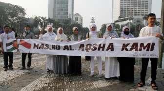 Aliansi Indonesia Membela Masjid Al Aqsa di kawasan Car Free day, Jakarta, Minggu (23/7/2017).