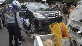 Marak Parkir Liar, Pendapatan Pajak Parkir DKI Merosot 50 Persen