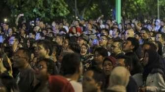 Band Potret tampil memukau ribuan penonton dalam event bertajuk The 90s Festival di Gambir Expo, Kemayoran, Jakarta, Sabtu (25/11). [Suara.com/Kurniawan Mas'ud]