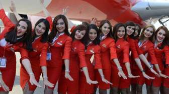 Air Asia Optimistis Penjualan Tiket Stabil