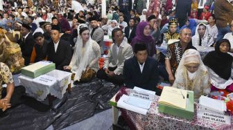 199 Penghulu Nikahkan 557 Pasang Pengantin di Nikah Massal Malam Tahun Baru