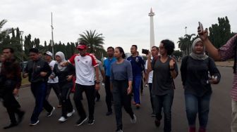 Jalan Kaki ke Balai Kota, Menteri Rini Temui Anies Baswedan