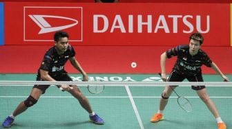 Ganda campuran unggulan pertama asal Indonesia, Tontowi Ahmad dan Liliyana Natsir melawan pasangan Cina, Zhang Nan dan Liu Xuanxuan dalam babak perempat final Indonesia Masters 2018 di Istora Senayan, Jakarta, Jumat (26/1).