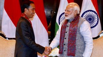 Temui PM India, Jokowi Keluhkan Kenaikan Tarif Kelapa Sawit