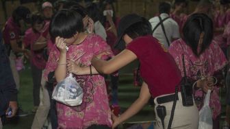 Polisi mendata kembali puluhan warga negara Cina yang terlibat kasus 'cyber crime' saat proses deportasi di Polda Bali, Denpasar, Jumat (2/2).