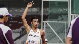 Atlet lompat tinggi Rizky Ghusyafa Pratama di test event Asian Games, (11/2).(Suara.com/Kurniawan M)