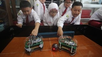 SD Muhammadiyah 4 Surabaya Juarai Kompetisi Robot di Singapura