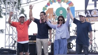 Detik- Detik Susi Pudjiastuti Menyentuh Garis Finish di Aquathlon