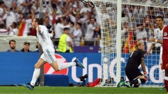 Ekspresi gol winger Real Madrid Gareth Bale dalam pertandingan Real Madrid vs Liverpool di final Liga Champions, di Stadion NSK Olimpiyskiy, Kiev, Minggu (27/5).