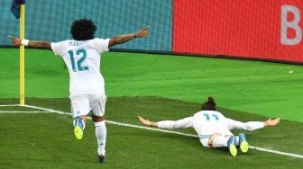 Ekspresi gol winger Real Madrid Gareth Bale dalam pertandingan Real Madrid vs Liverpool di final Liga Champions, di Stadion NSK Olimpiyskiy, Kiev, Minggu (27/5).