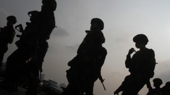 Kapolri Jenderal Pol Tito Karnavian dan Panglima TNI Marsekal TNI Hadi Tjahjanto bersama-sama memimpin apel Operasi Terpusat Ketupat 2018 di Lapangan Monas, Jakarta Pusat, Rabu (6/6/2018). [Suara.com/Oke Atmaja]