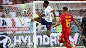 Aksi striker Inggris Marcus Rashford mengancam gawang Belgia. (Alex Romanov/Anadolu)