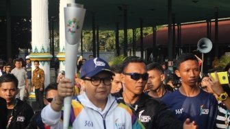 Jadi Pelari Pertama Torch Relay Asian Games 2018, Menlu Retno Bangga