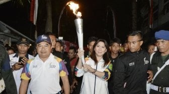 Pawai Obor Asian Games Istana Tampaksiring