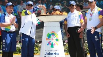 BRI Meriahkan Kirab Obor Asian Games 2018 di Denpasar