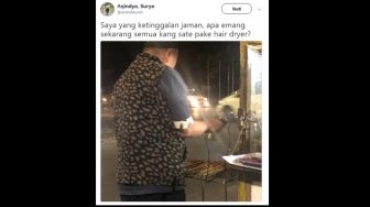 Viral, Cara Unik Tukang Sate Ini Mengipasi Jualannya