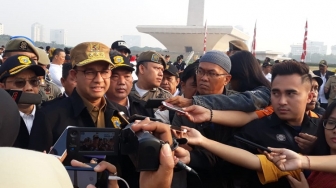 Ikuti Aturan, Anies Kembali Cat Hitam Separator Warna Warni