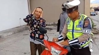 Berkendara Sambil Merokok Kini Kena Tilang, Sanksinya Dipenjara 3 Bulan