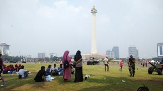 Ada Air Mancur Menari, Warga Penuhi Monas Sejak Pagi