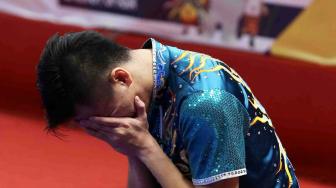 Atlet Wushu Indonesia Edgar Xaier Marvelo saat tampil di nomor Chanquan Putra pada Asian Games 18 di JEXPO, Kemayoran, Jakarta, Minggu (19/8). ANTARA FOTO/INASGOC/ Gino F Hadi