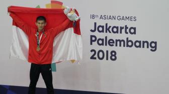 Pada pertandingan itu Iqbal Candra Pratama berhasil menambah medali emas untuk Indonesia setelah menang dengan skor 1-4.(Suara.com/Oke Dwi Atmaja)
