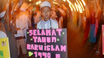 Kemeriahan Pawai Obor Sambut Tahun Baru Islam 1440 H