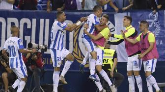 Gelandang Leganes Oscar Rodriguez merayakan gol kedua timnya saat pertandingan  Leganes melawan Barcelona di Estadio Municipal de Butarque, Spanyol, Rabu (26/9). [OSCAR DEL POZO]