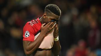 Ekspresi gelandang Manchester United Paul Pogba usai timnya Manchester United dikalahkan Juventus di Old Trafford, Manchester, Inggris, Selasa (23/10).  [AFP/Oli SCARFF]