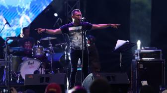 Vokalis grup band Kidnap Katrina Anang Hermansyah beraksi pada acara "90's Festival" di JIEXPO Kemayoran, Jakarta, Sabtu (10/11). [Suara.com/Muhaimin A Untung]