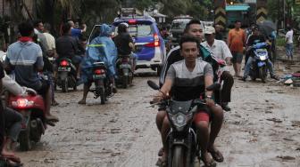 Kisah Heroik, Warga Bonceng Dua Bocah Pakai Motor Saat Dikejar Tsunami