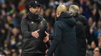 Ekspresi pelatih Liverpool, Jurgen Klopp usai timnya dikalahkan oleh Manchester City di Etihad Stadium, Manchester Inggris, Jumat (4/1). [Oli SCARFF / AFP]