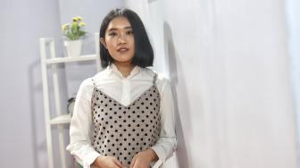 Radhini Melepas Lelah di Awal Tahun