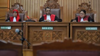 Suasana sidang vonis terdakwa Narkoba jenis kokain Richard Muljadi di Pengadilan Negeri Jakarta, Kamis (21/2).[Suara.com/Muhaimin A Untung]