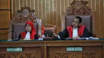 Suasana sidang vonis terdakwa Narkoba jenis kokain Richard Muljadi di Pengadilan Negeri Jakarta, Kamis (21/2).[Suara.com/Muhaimin A Untung]