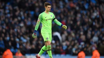 Kiper Chelsea, Kepa Arrizabalaga, menolak diganti saat melawan Manchester City pada final Piala Liga Inggris di Stadion Wembley, London, Inggris, Minggu (24/2). [Adrian DENNIS / AFP]